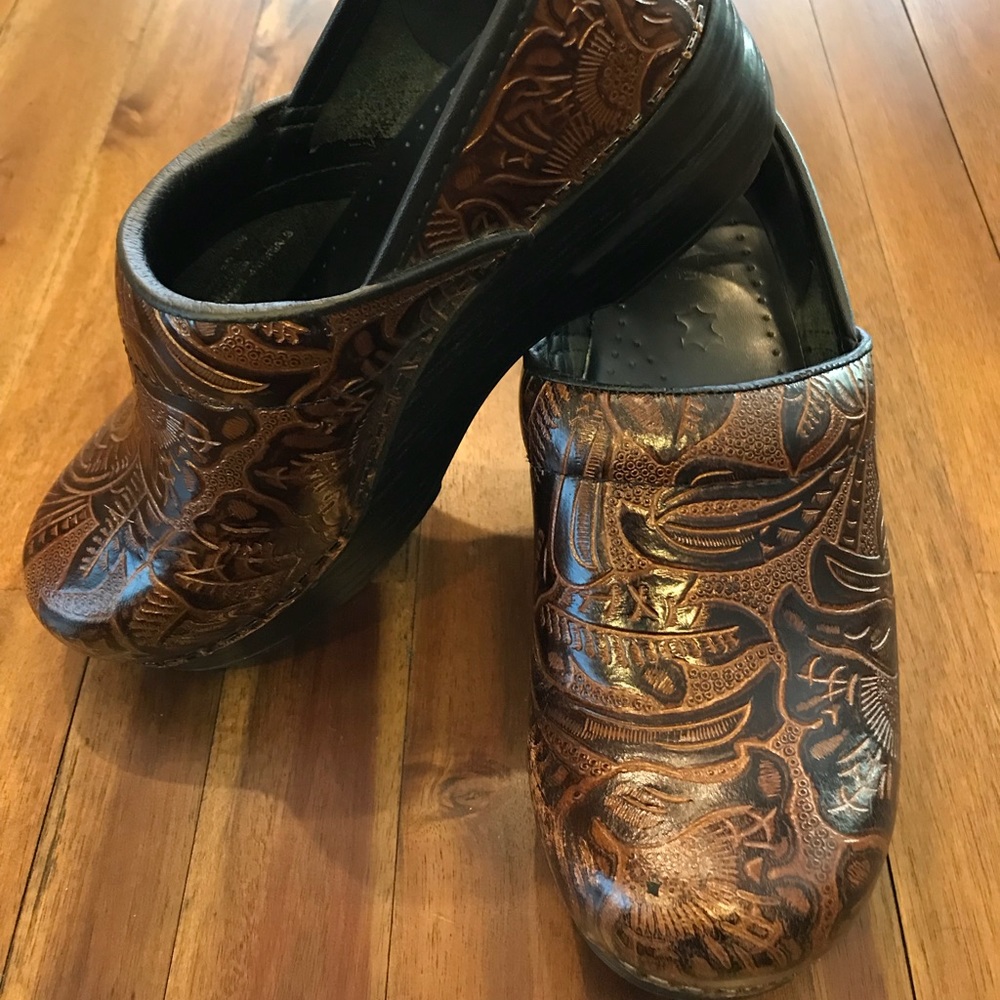 Dansko tooled leather clogs